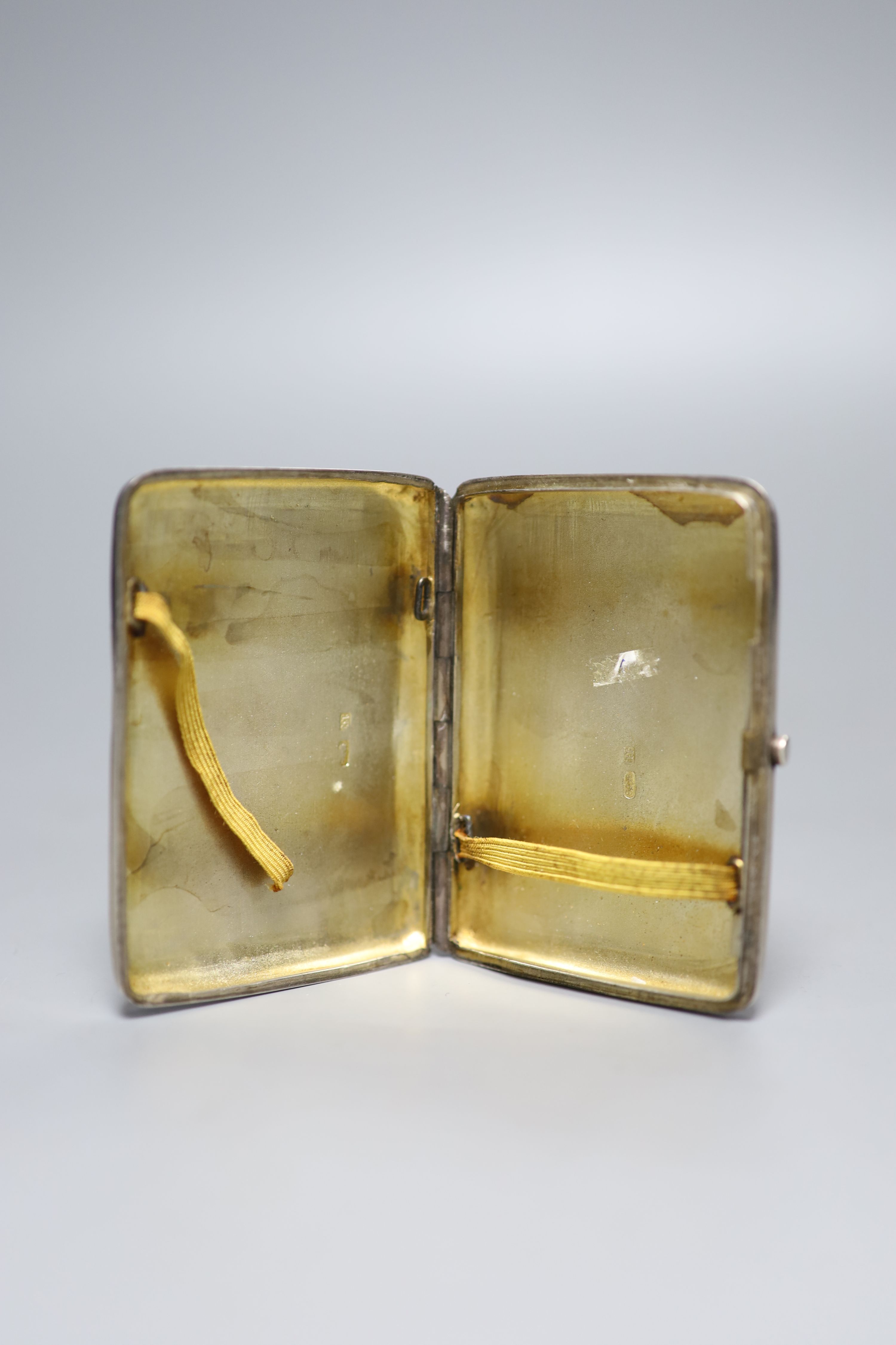 A late 19th century Russian 84 zolotnik and niello cigarette case, 89mm and an Austro-Hungarian 900 standard white metal and niello cigarette case, gross 7oz.